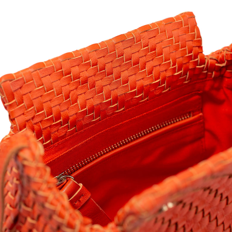 Small orange hotsell clutch bag